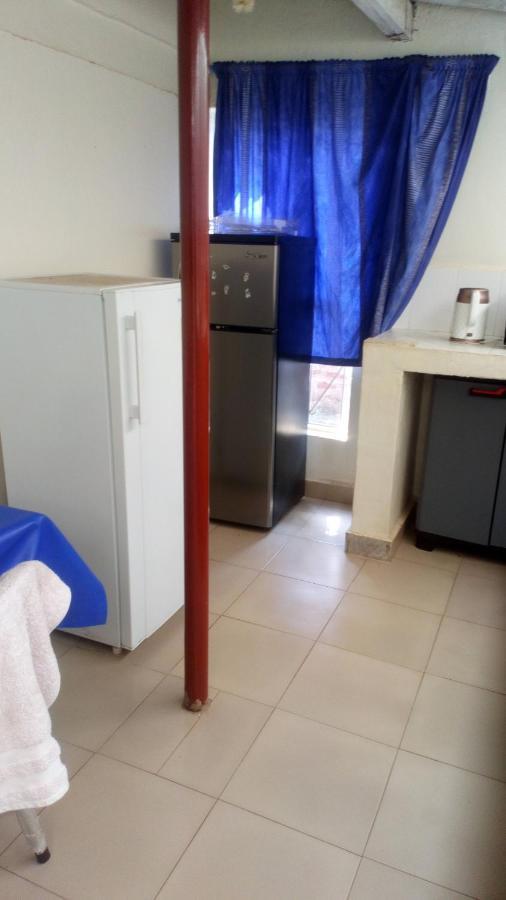 Отель Knowledge For Change House Fort Portal Экстерьер фото